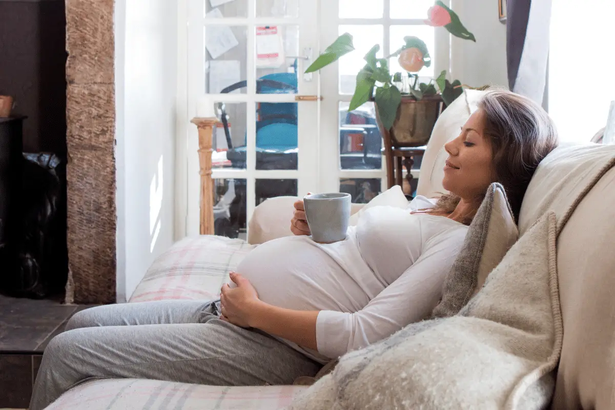 Pregnant woman finding relief from pregnancy discomforts.